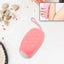 Soft silicone bath brush for gentle exfoliation and deep cleansing.