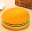 Close-up of burger-shaped sticky notes, showcasing their realistic design and vibrant colors.