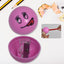 Brightly colored round kids pencil sharpener with fun cartoon designs.