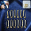 Set of golden safety pin brooches with embedded stones for shawls and scarves
