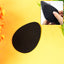 Anti-slip grip sticker applied on shoe sole for enhanced traction
