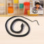 Realistic rubber snake toy showing lifelike scales and flexible body