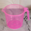 Transparent 1200ml bath water mug from Bathora, ready for use in a clean bathroom.