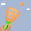 Brightly colored catapult ball toy set up for exciting outdoor play.