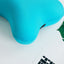 Detailed view of the soft microbead neck pillow's texture.