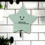A set of strong self-adhesive hooks displayed neatly on a tiled kitchen wall, ready for use.