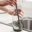 Multipurpose bottle cleaning brush with ergonomic handle for kitchen use.