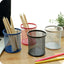 Black metal mesh pen holder, perfect for organizing an office desk.