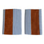Pair of leather and cotton pillow covers on a modern sofa