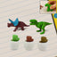 A set of five colorful dinosaur puzzle erasers and egg shapes.