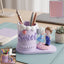 Resin sweet couple pen holder on desk with pens