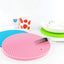Silicone hot mat in a kitchen setting, protecting a countertop from a hot pot.