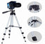 A Gambit camera tripod with a phone holder extended, ready for capturing photos.