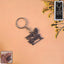 Radhe Krishna Metal Keychain featuring peacock feather design on premium metal alloy