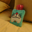 Doremon hot water bag with a soft blue cover, front view.