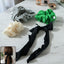 Soft fabric hair scrunchie with stylish bow tie design in assorted colors