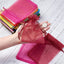 A stack of elegant organza gift bags, showcasing their sheer fabric and versatile design.