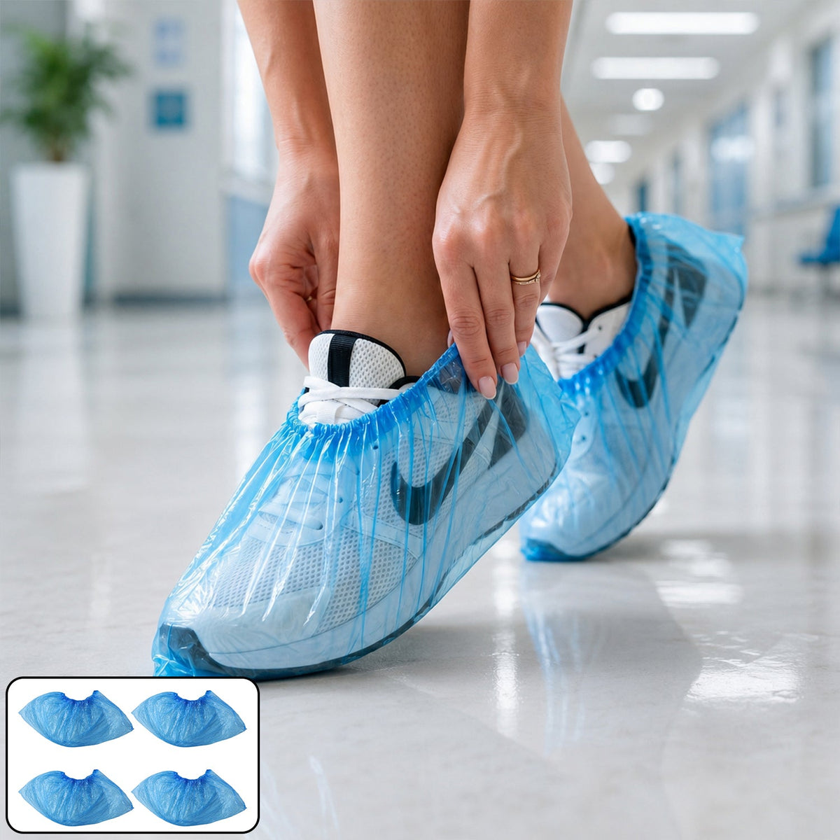 Blue disposable shoe covers with elastic fit for hygiene and protection. Main image
