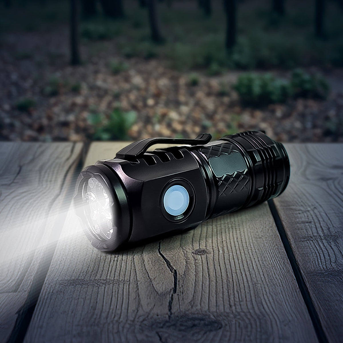 Compact rechargeable LED torch illuminating a dark area. Main image