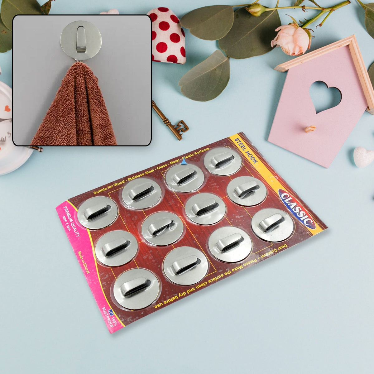Set of 12 self-adhesive steel wall hooks for home organization. Main image