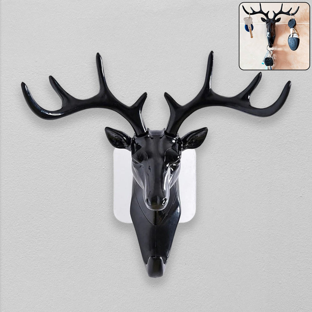 Elegant deer head wall hook in black, showcasing its self-adhesive design. Main image