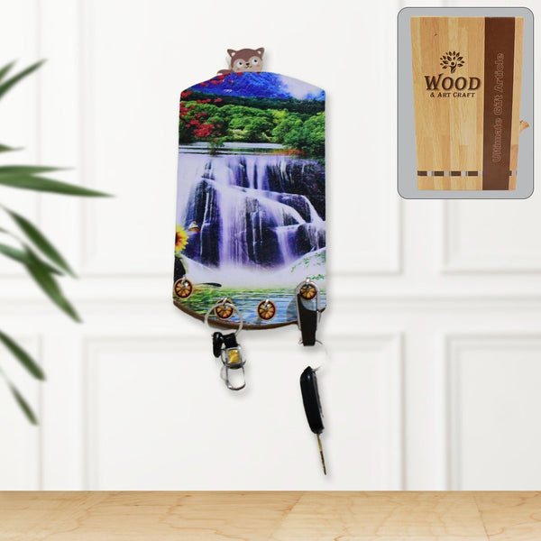 Vertical wooden wall decor with scenic art and integrated hanging hooks.
