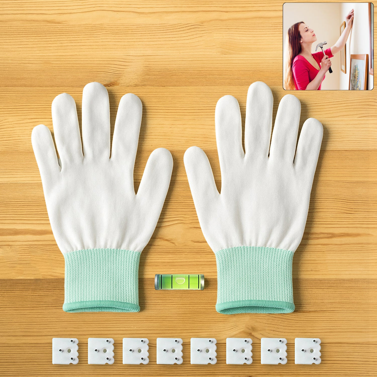 Multi-purpose picture hanging kit laid out with gloves, hooks, and mini level Main image