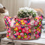 A stylish black foldable travel bag with an expandable bottom layer, perfect for weekend trips.