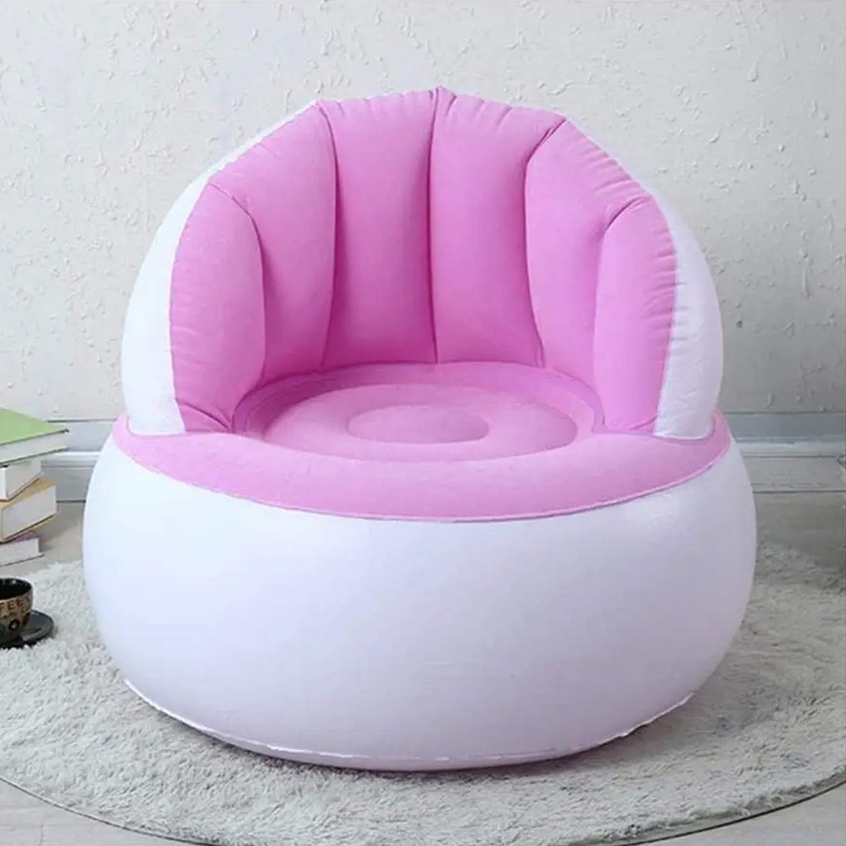 Child happily sitting on a bright yellow Kids Inflatable Sofa Chair with backrest. Main image