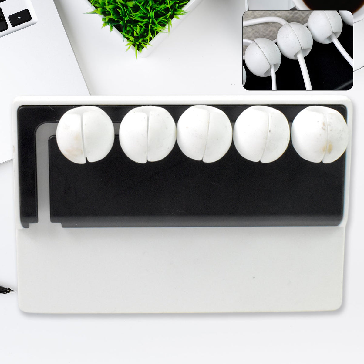 5-slot adhesive cable holder organizing wires on a desk Main image