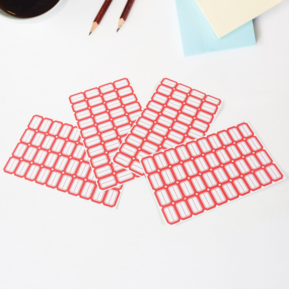 Stack of red border label stickers for versatile home and office organization. Main image
