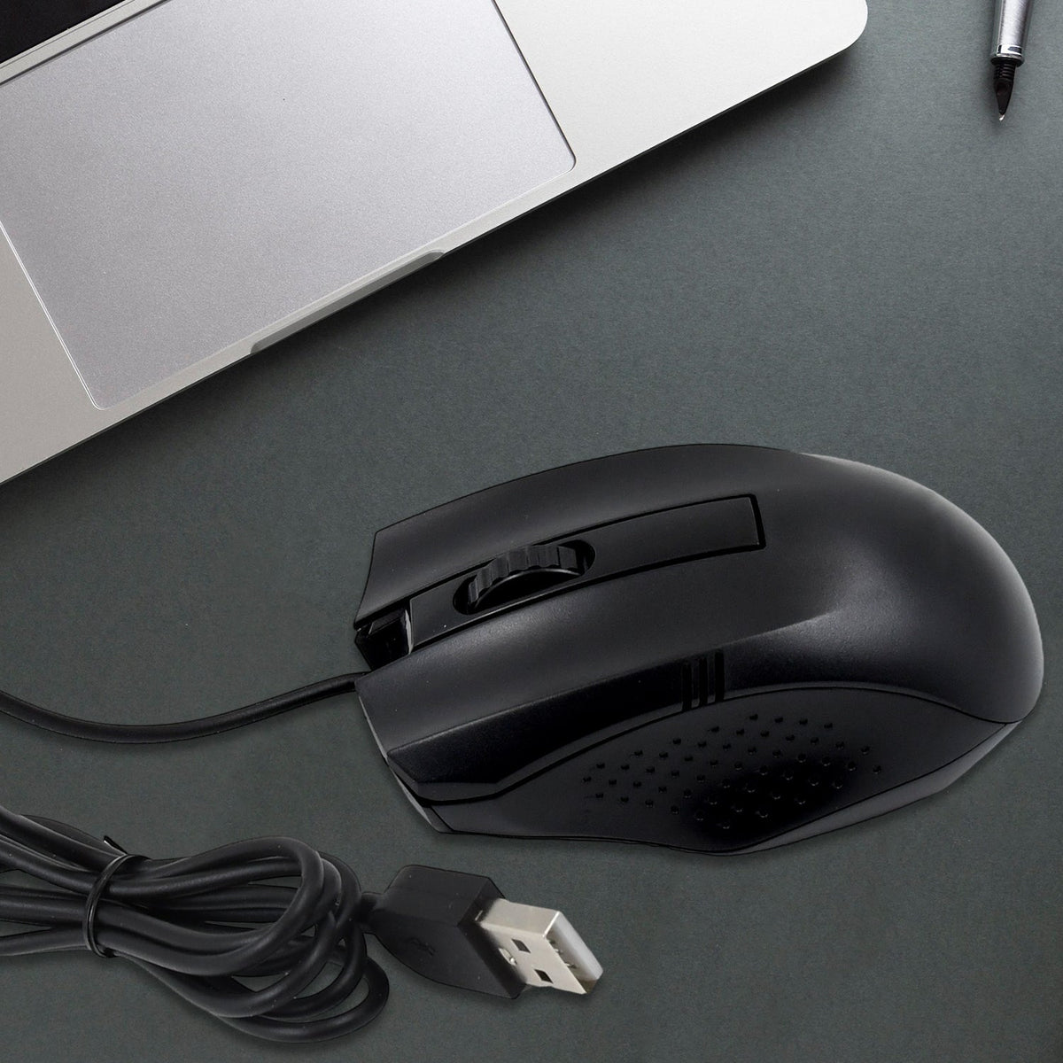 A black wired optical mouse from Compshop with its USB cable clearly visible. Main image