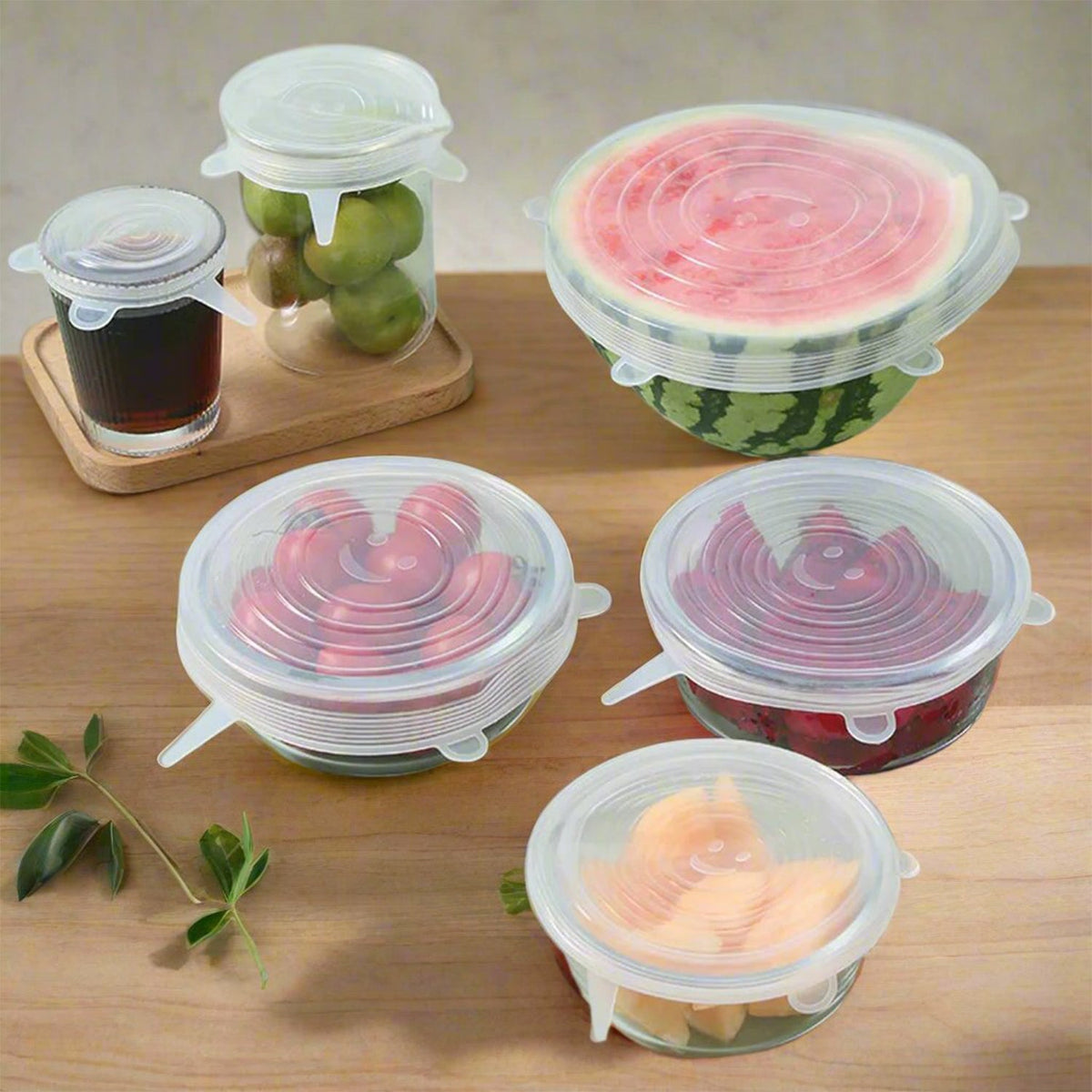 A set of six flexible silicone food covers in various sizes, perfect for eco-friendly food storage. Main image