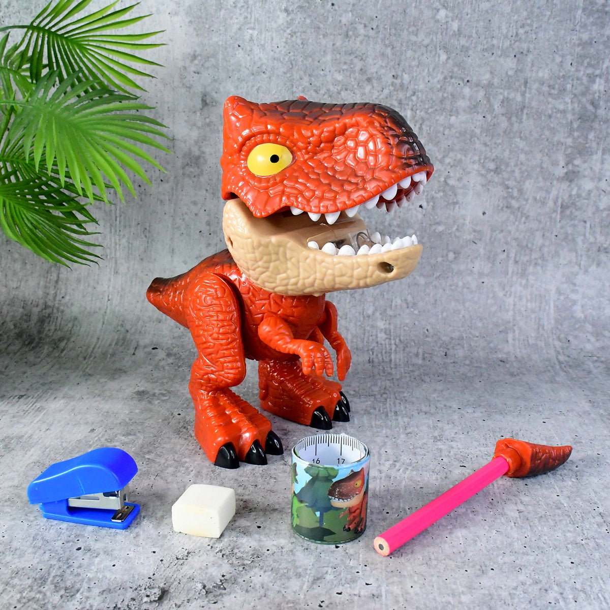 Dinosaur shaped stationery gift set featuring pencil, sharpener, and stapler Main image