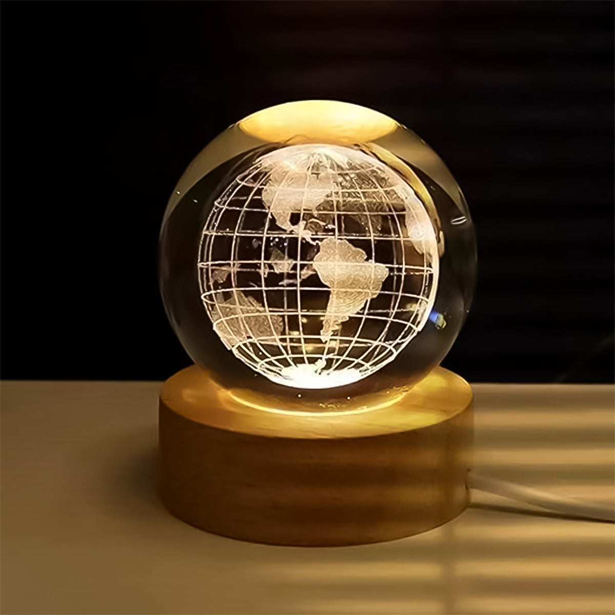 3D crystal ball lamp with world map projection on a wooden base. Main image