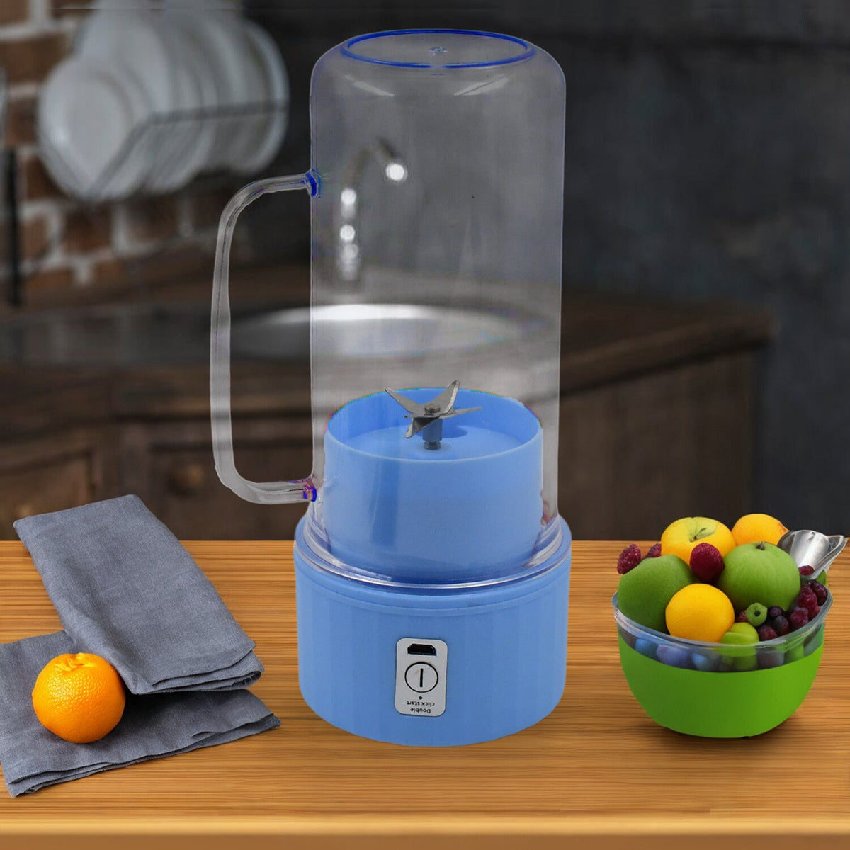 Portable electric juicer with handle and straw for fresh drinks. Main image