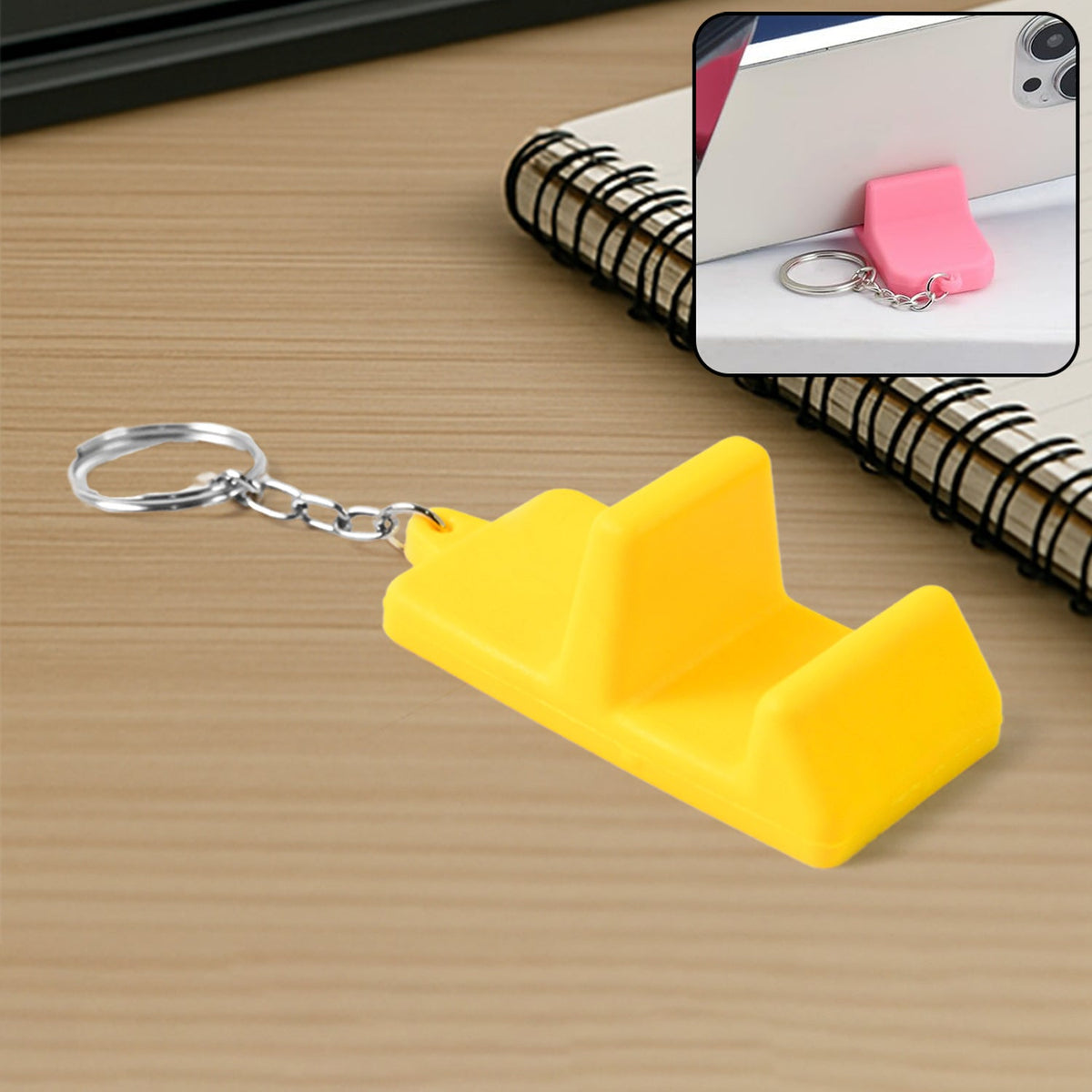 Compact plastic mobile stand keychain holding smartphone in horizontal position Main image