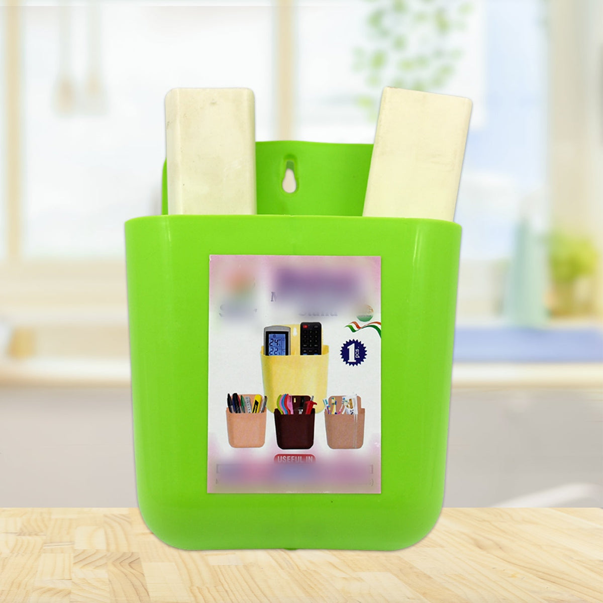 GlimmerHome 2-section wall holder neatly organizing a mobile phone and remote. Main image