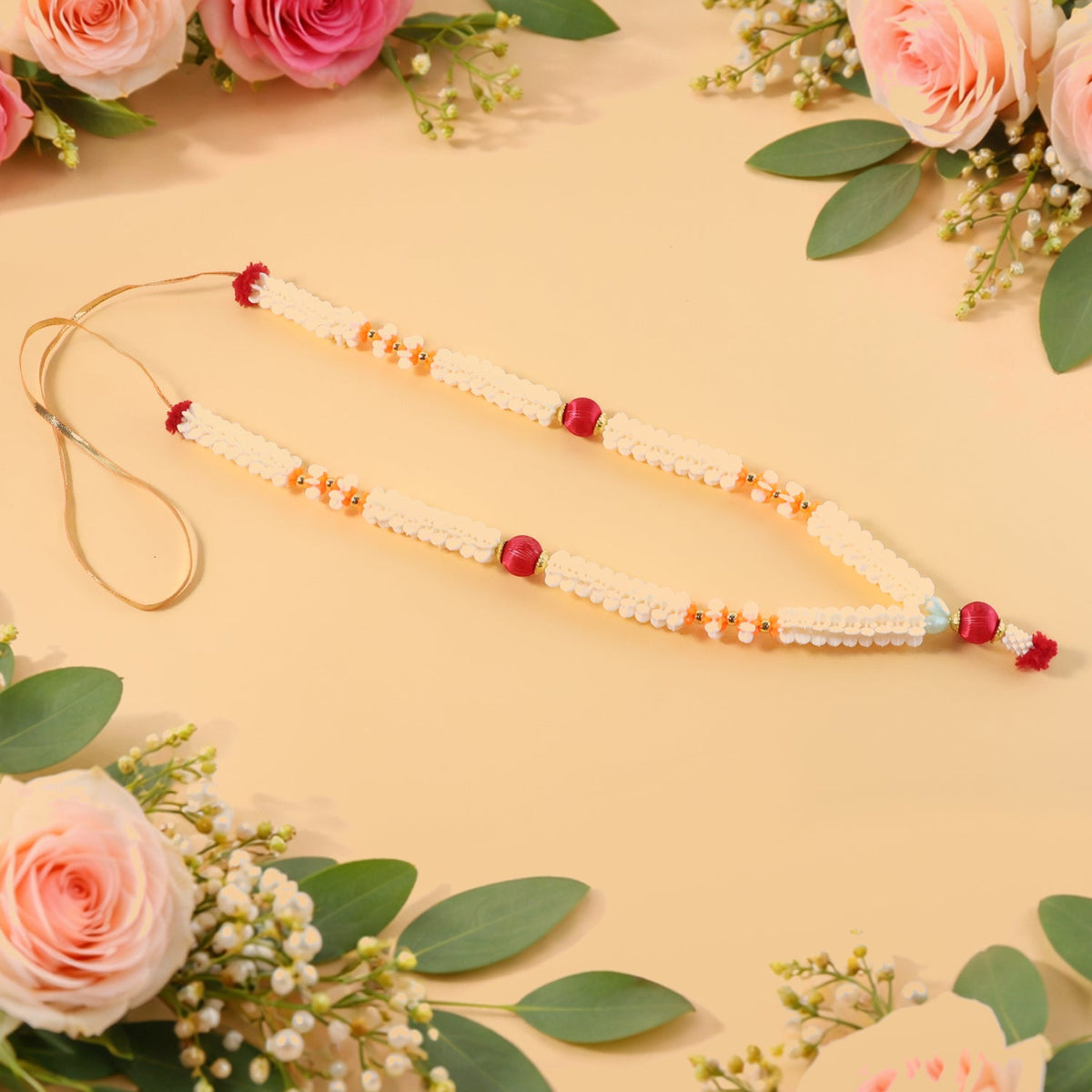 Traditional pooja gajra garland with floral beads for religious decoration Main image
