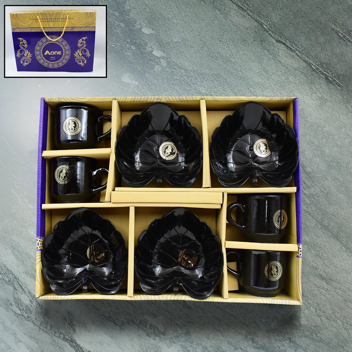 A One 8-piece ceramic tea cup set with leaf-shaped serving bowls arranged on a white surface. Main image