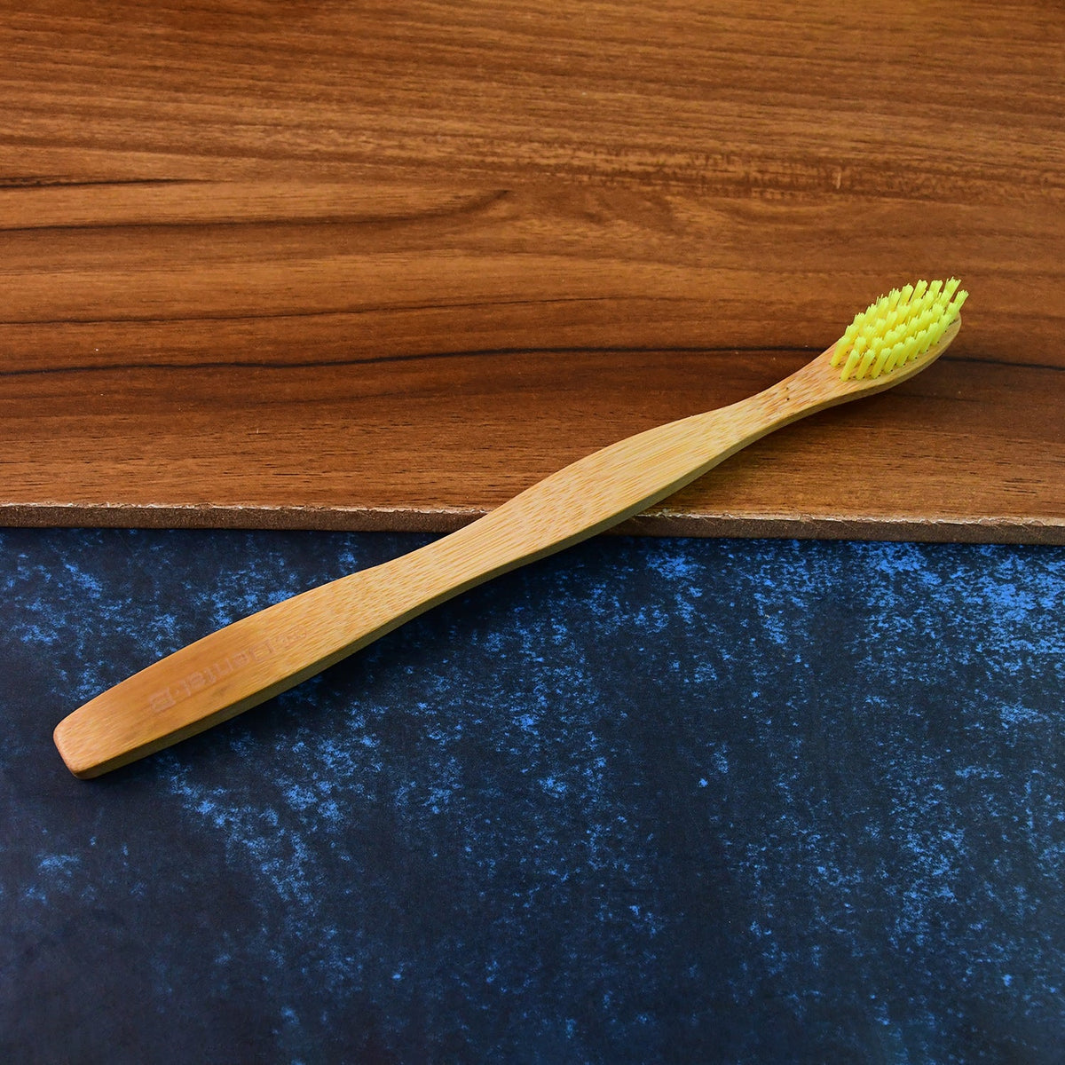 Eco-friendly bamboo toothbrush with medium bristles for gentle oral care Main image