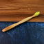 Eco-friendly bamboo toothbrush with medium bristles for gentle oral care