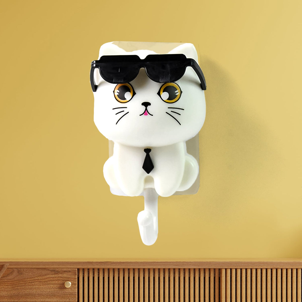 Cute cat wall hook in lavender with sunglasses down, ready to hold keys or coats. Main image