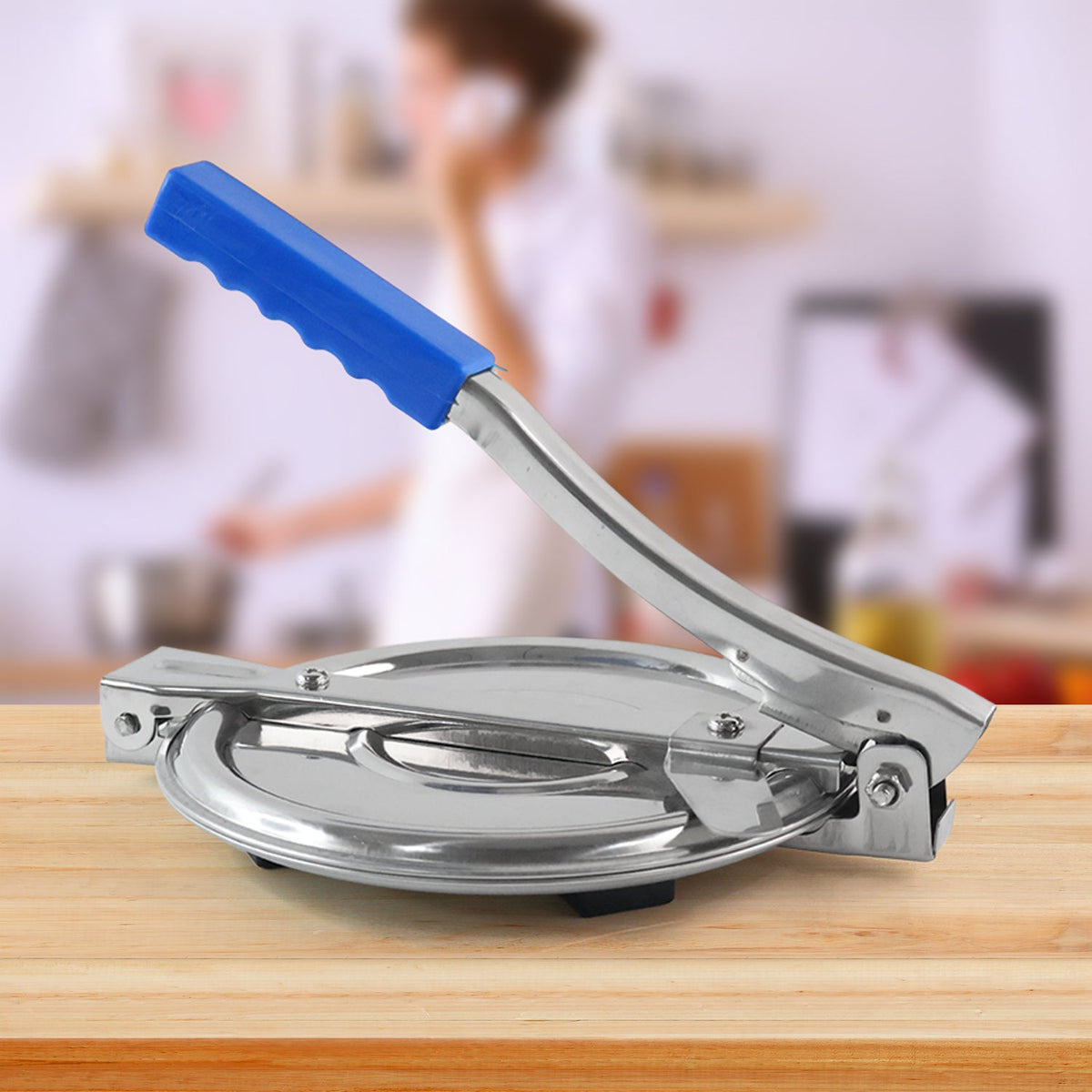 Puri Press Maker, stainless steel, with non-slip handle on a white background, ready for use. Main image