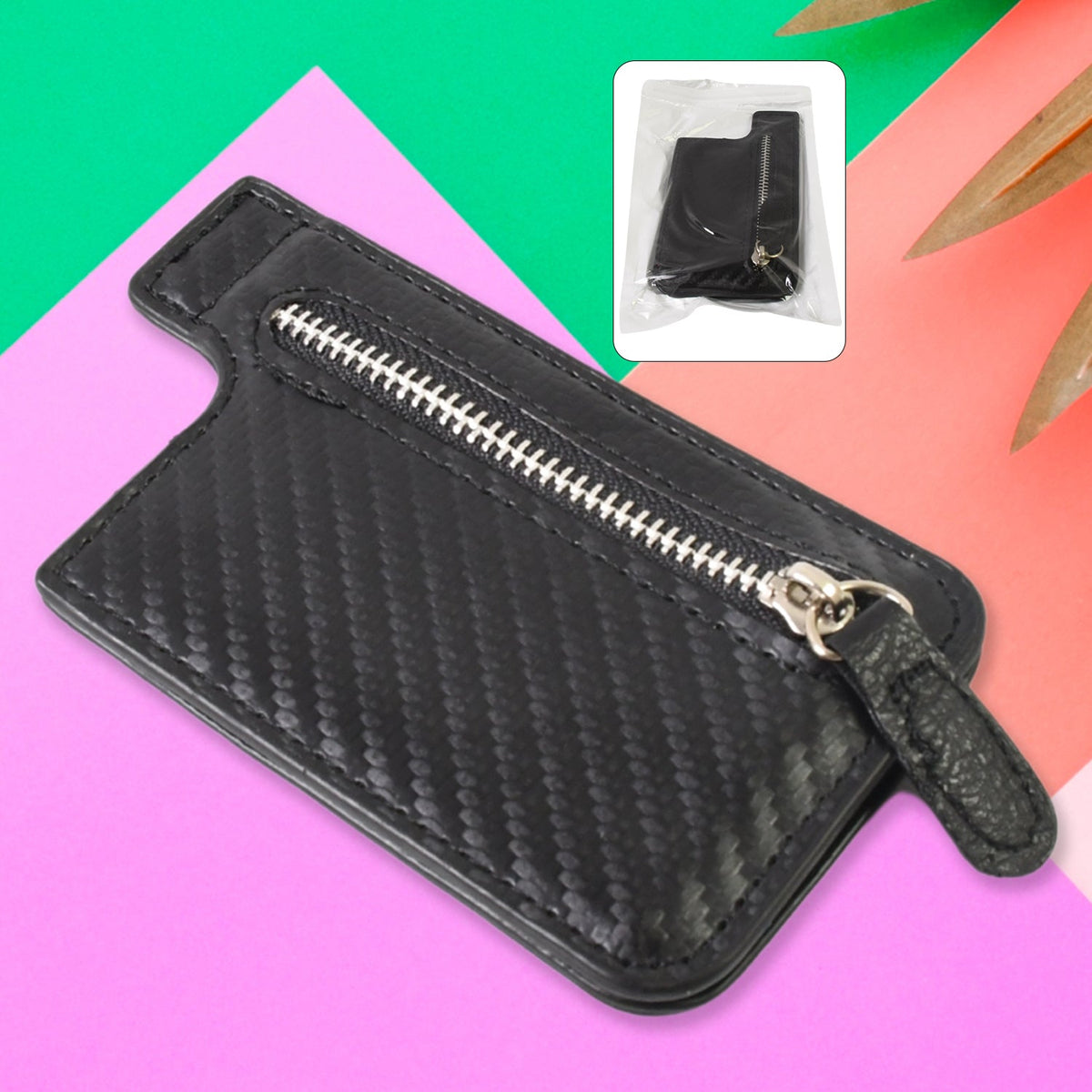 Black adhesive phone card holder attached to a smartphone, showcasing its sleek design. Main image