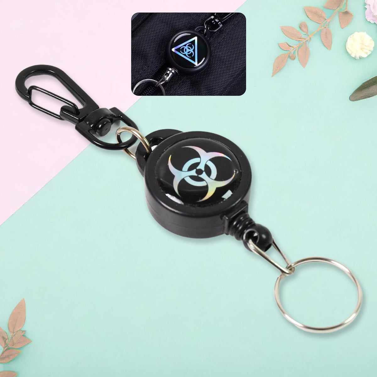 Durable retractable key chain with steel wire, shown ready for attachment. Main image