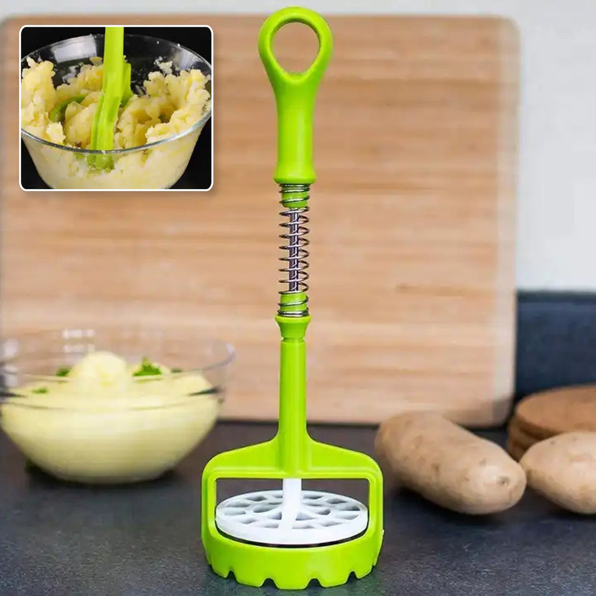 One-handed potato masher with ergonomic comfort grip and stainless steel spring. Main image