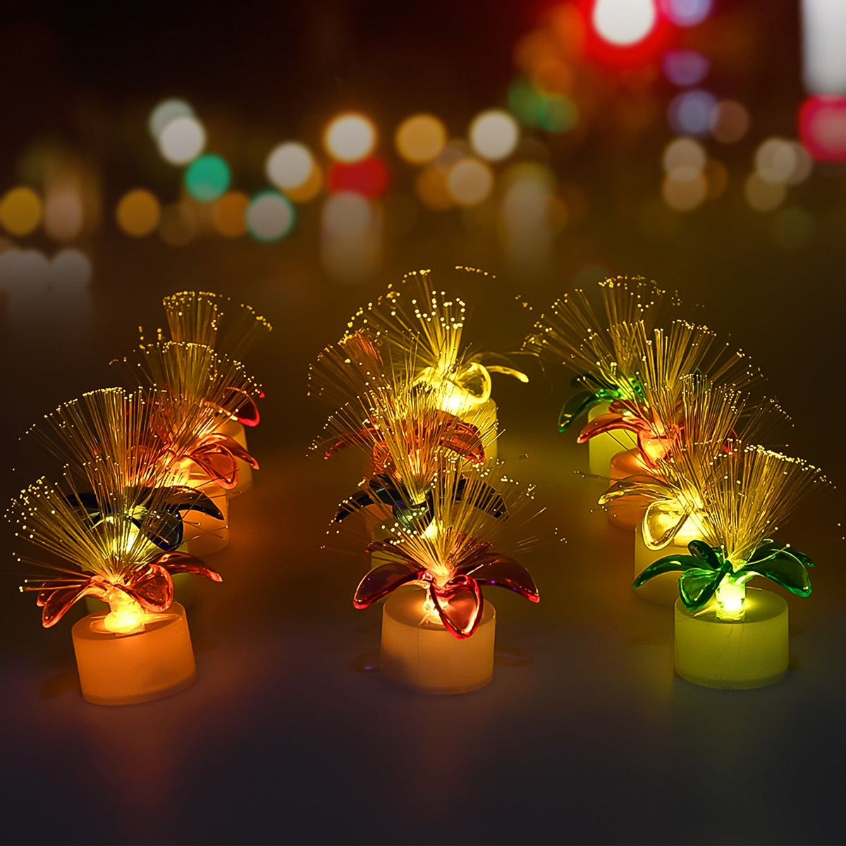 Pack of 12 fiber optic LED centerpieces with vibrant color-changing lights. Main image