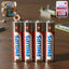 Pack of 4 AA alkaline batteries providing reliable power