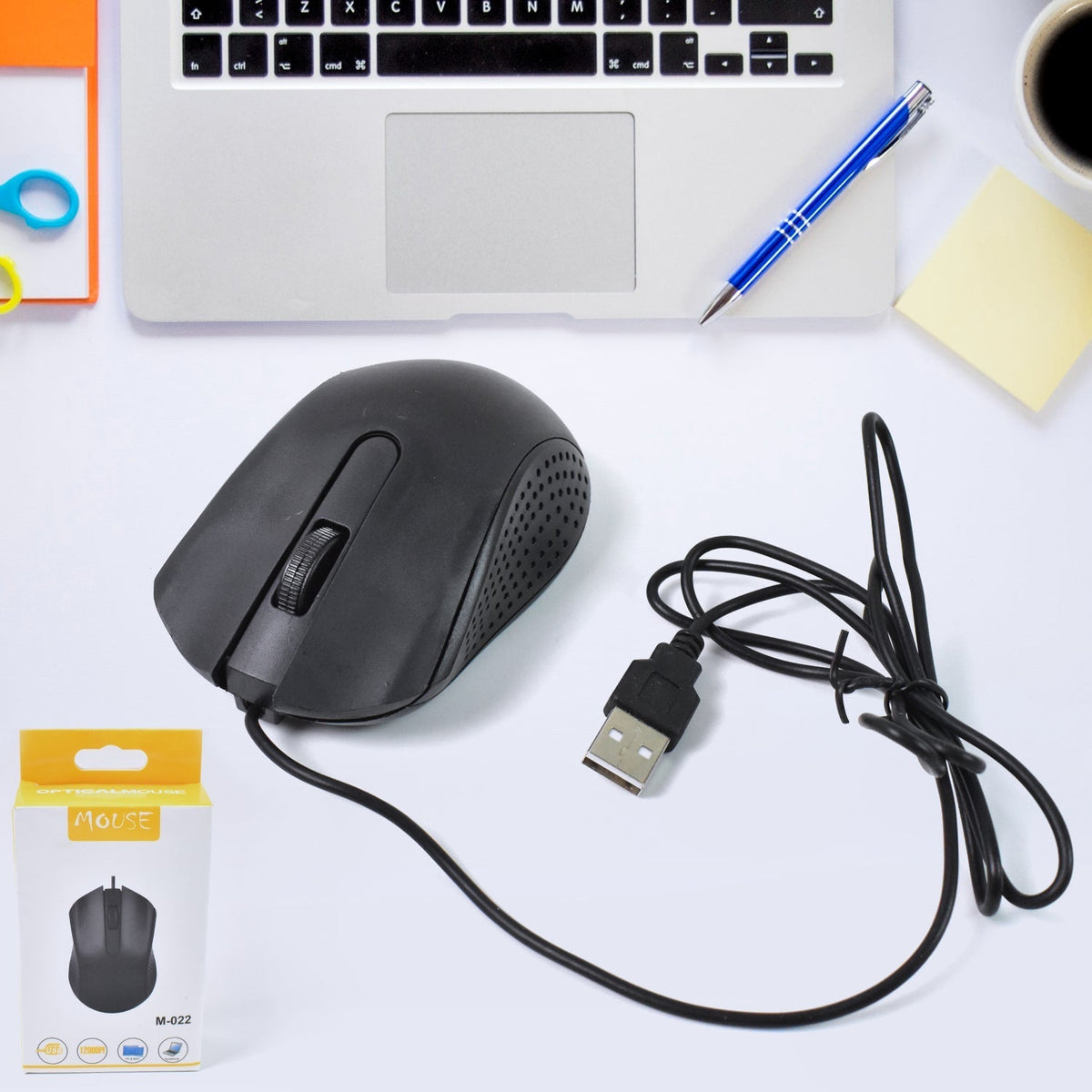Black Compshop Wired Optical Mouse M-022 with USB cable on a desk. Main image